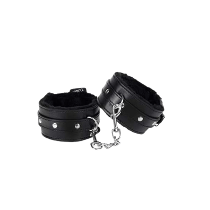 Padded black shackles with soft interior, part of the Beginner Bondage Kit by Club69, perfect for a comfortable experience.