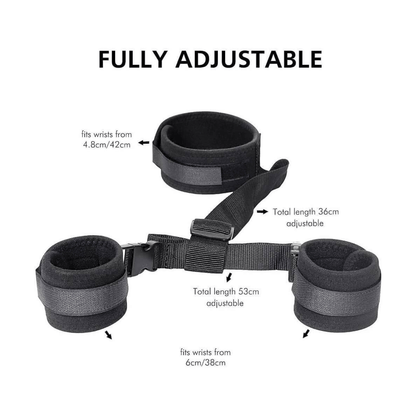 Fully adjustable neck to wrist restraints featuring padded material for comfort and durability, ideal for exciting experiences.